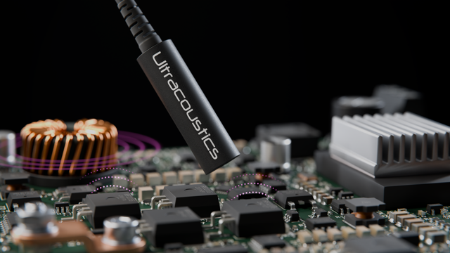 Illustration of a BROADSONIC optical probe measuring acoustic emissions above a circuit board.